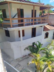 an external view of a house at Pousada pôr do sol in Cairu