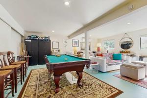 a living room with a pool table in it at Heron Escape in Bodega Bay +20 photos