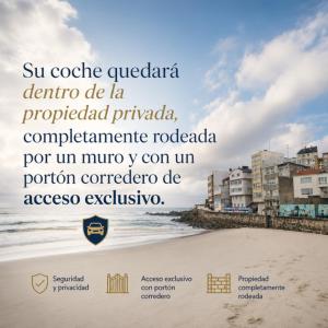 a picture of the beach with a sign on the beach at Casa completa - Camiño dos faros - Atlantico Malpica in Malpica