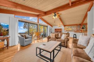 a living room with a couch and a table at Heavens Door in Beech Mountain +23 photos