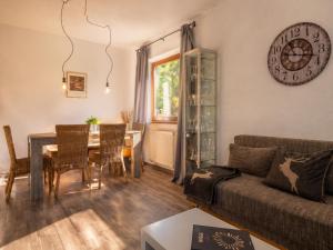 a living room with a couch and a table at Ferienwohnung Feichten in Westendorf