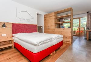 Un pat sau paturi într-o cameră la Lerchnhof