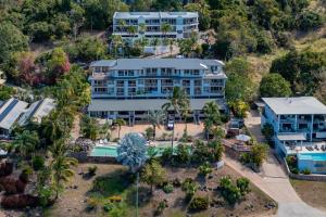 an aerial view of a resort with a pool at at Boathaven Bay Holiday Apartments in Airlie Beach