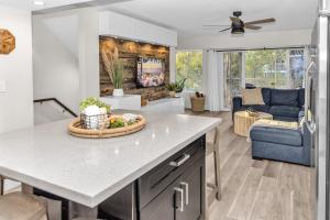 a kitchen and living room with a table at Key Largo Kawama villa K1 in Key Largo