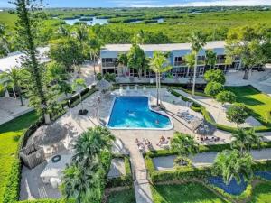 an overhead view of a pool at a resort at Key Largo Kawama villa K1 in Key Largo