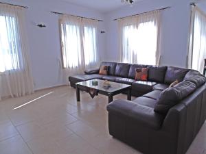 Posezení v ubytování Eliofos Luxury Villa