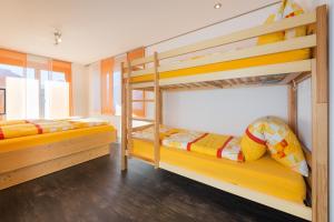 Ένα ή περισσότερα κρεβάτια σε δωμάτιο στο AZapartments Clarino +25 φωτογραφίες