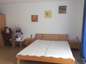 Posteľ alebo postele v izbe v ubytovaní Apart Riviera Lipno J4-12