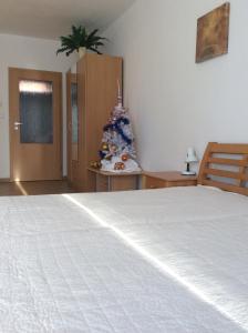 Posteľ alebo postele v izbe v ubytovaní Apart Riviera Lipno J4-12