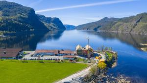 an aerial view of a resort on a lake at Sirdalsvatnet Hotel in Sirdal in Tonstad +27 photos