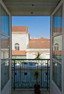a view from the balcony of a building at Apartments in downtown in Lisbon