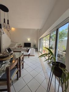 a living room with a couch and a table at Vacation Villa Marina in Puerto Vallarta