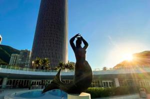 a statue of a mermaid in front of a building at Hotel Nacional Rio in Rio de Janeiro