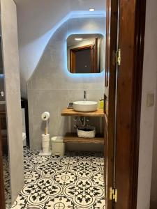 a bathroom with a sink and a mirror at Litus Amoris 2 in Sidari +60 photos