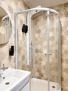 a bathroom with a shower and a sink at Concept Royal Edirne in Edirne +25 photos