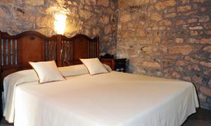 Posteľ alebo postele v izbe v ubytovaní Hotel Restaurant Verdià