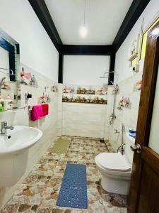 a bathroom with a toilet and a sink at The Bliss Homestay in Ella +48 photos