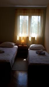 Postel nebo postele na pokoji v ubytování Apartment Ivo