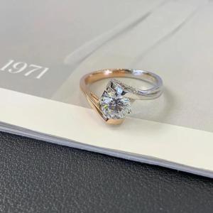 a diamond engagement ring sitting on top of a paper at Antiquecut Jewelry in Surat