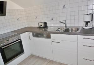 Kuchyň nebo kuchyňský kout v ubytování Ferienwohnung Pickenhan