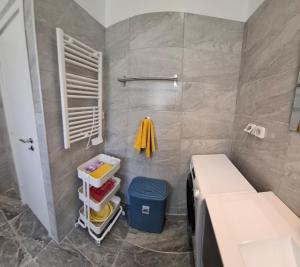 a small bathroom with a bed and a shower at Lemon House in Athens +17 photos