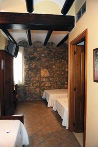 Posteľ alebo postele v izbe v ubytovaní Hotel Restaurant Verdià