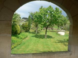 Zahrada ubytování Gites face rivière Saint-Emilion