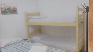 Krevet ili kreveti na sprat u jedinici u okviru objekta Hospedaria Praia e Sol