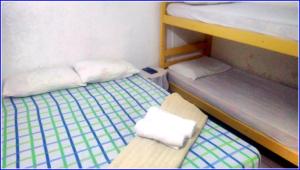 Krevet ili kreveti u jedinici u okviru objekta Hospedaria Praia e Sol