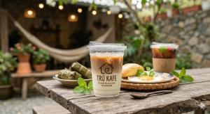 a table with two drinks and a plate of food at Old Village House in Yên Bài