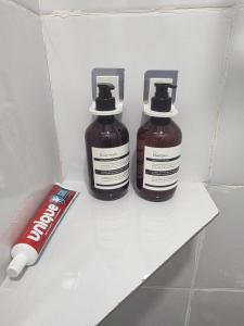 two bottles of honey and a coke in a refrigerator at 7641guesthouse in Basdiot +31 photos