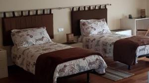 a bedroom with two beds in a room at B&B Il Cormorano in Scardovari