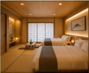 a hotel room with two beds and a window at Tara Hotel & Spa in Hanoi