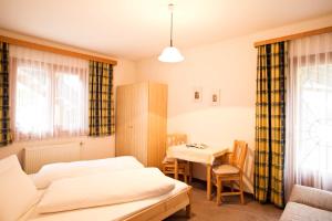 Łóżko lub łóżka w pokoju w obiekcie Ferienhaus Nationalpark