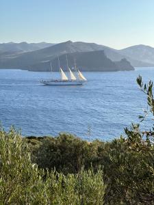a large sail boat in a large body of water at ARETI Horizon in Kástron