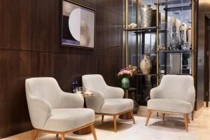 a waiting room with four chairs and a table at Bentley Hotel Old City-Special Class in Istanbul