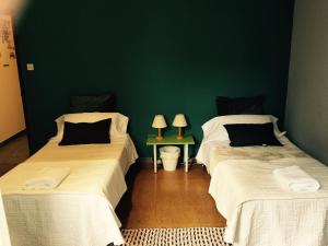 Postel nebo postele na pokoji v ubytování Apartment Lugo Rooms