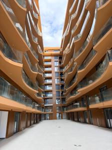 an image of a building with balconies at Luxurious seaside apartment in Sakës