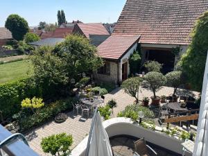 an aerial view of a house with a patio at Pension Amelie in Mörbisch am See