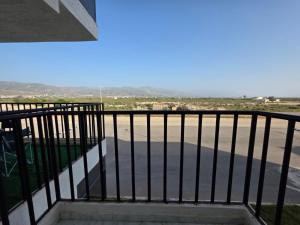 a balcony with a view of the desert at Appartement sur Mer in El Arba de Trougout +7 photos