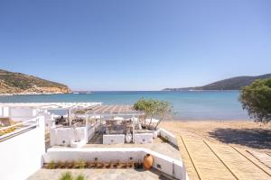 a view of a beach with the ocean in the background at Turquoise in Platis Gialos
