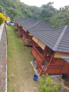 an overhead view of a building with red benches at Zena Cottage in Ende +9 photos