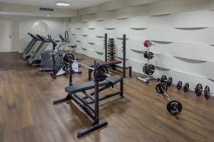 a gym with treadmills and elliptical machines at Bourbon Convention Hotel Santos in Santos