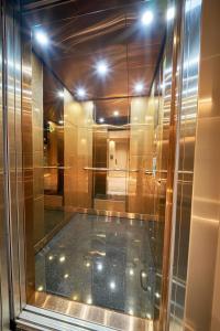 a room with a shower with glass walls at Elysia Hotel in Istanbul +132 photos