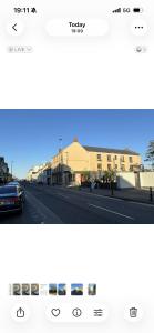 a picture of a street with a car on the road at Blue Water House in Bundoran
