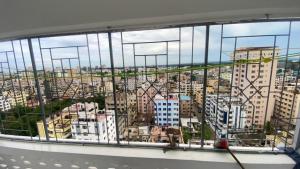 a view of a city from a window at Mombasa city view in Mombasa