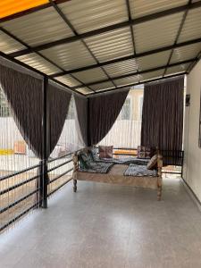 a large tent with a bed in a room at Wings Ethno in Cholpon-Ata