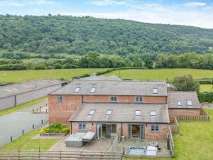 an aerial view of a large brick house at Y Stabl - Uk12742 in Acrefair