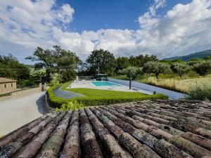 a view from the roof of a house with a swimming pool at Bea Villa Bea in Caldarola