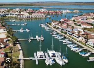 an aerial view of a marina with boats in the water at EBB Tide Guesthouse in Velddrif